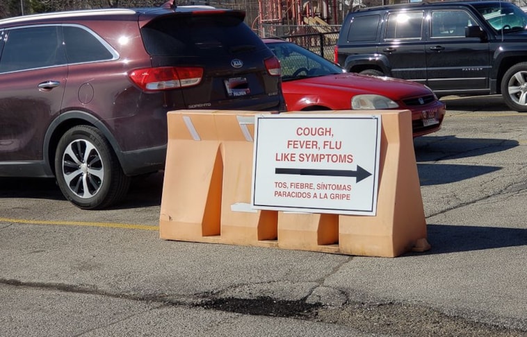 Temporary directional sign for Coronavirus testing site at hospital