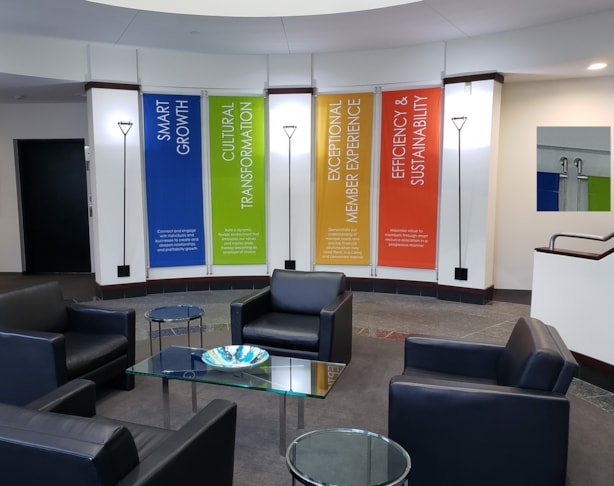 Fabric banners with stainless steel mounting system in corporate lobby