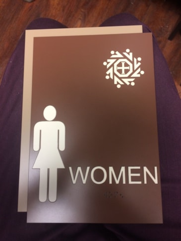Disability and Wayfinding Building Suite ADA bathroom signage in Houston, TX