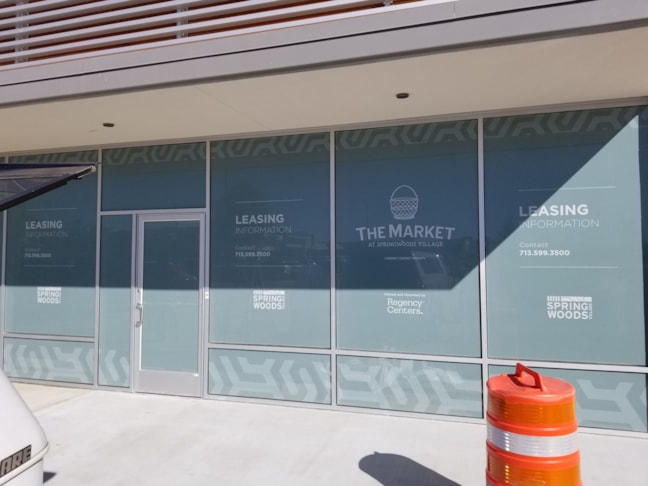 Regency Property manager new retail center window graphics
