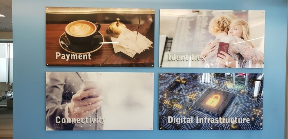 5 Foot wide, back printed acrylic displays that are stud mounted to the wall at G & D Group. 