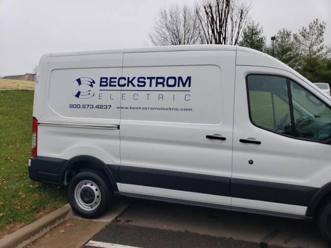 Vehicle branding on a Beckstrom Electric van. Their logo and contact info installed.