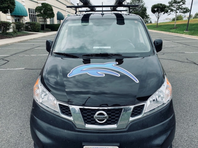 The Crystal Blue Aquatics logo makes a great digital hood ornament on their new fleet van.