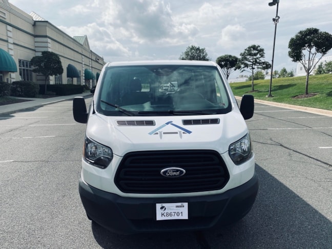 Liberty Home Remodeling logo fit perfectly on the hood of their new van.