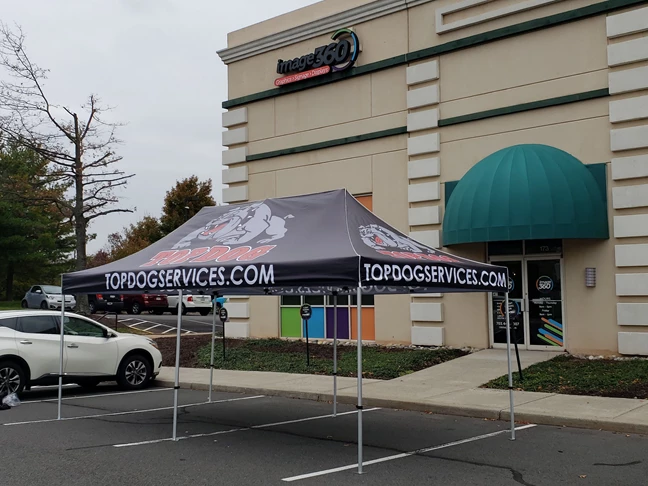 This 10 x 20 event tent was ordered by our friends at Top Dog. They customized the graphic with their logo and website.