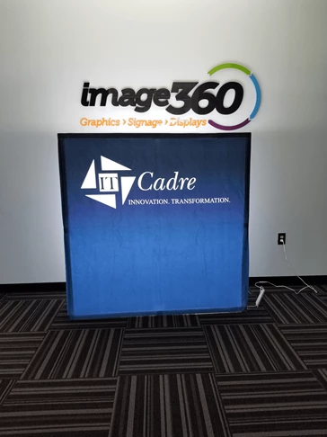 Illuminated custom printed fabric display is 5 tall. Easy to assemble, and light weight for easy travel for shows!