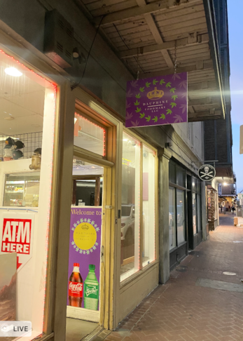 Hanging Signs for Dauphine Mart in the French Quarter