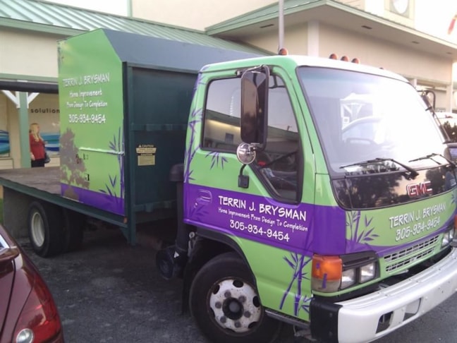 Wrapped cab and sides of heavy duty landscaping truck