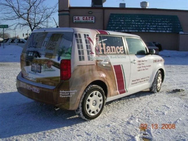 Digitally printed vinyl vehicle wrap and window graphics