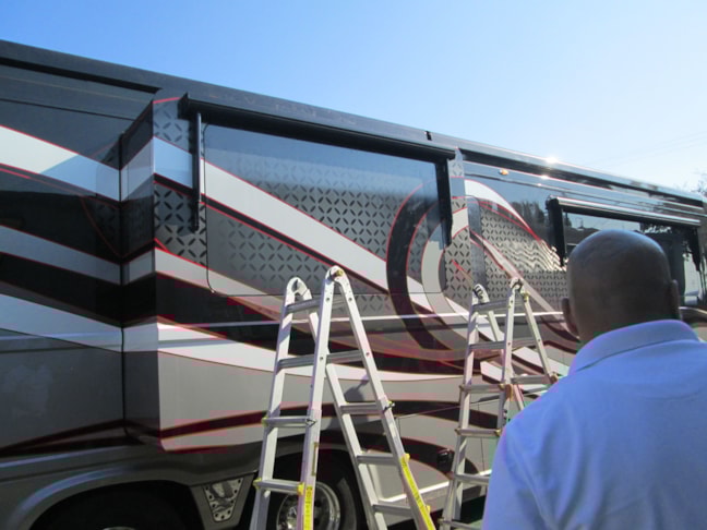 Complete custom window graphics designed and installed here at Image360 San Antonio west.  these were completely created from scratch to match the custom graphics on this beautiful motohome.