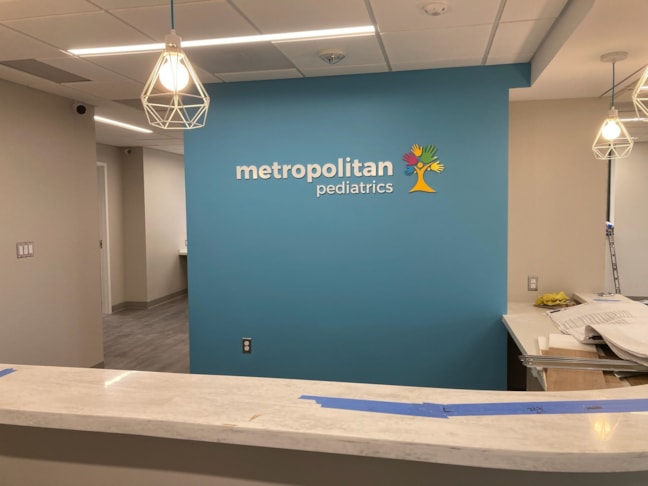 Acrylic dimensional lobby sign for pediatric practice